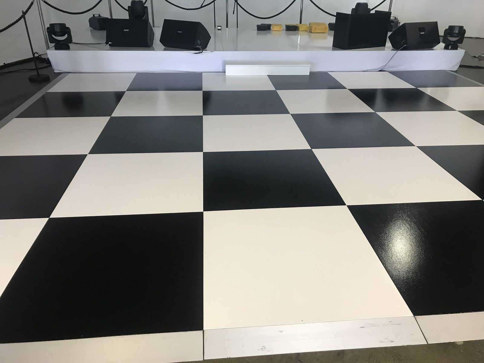 Black and white checkered floor at a gala event