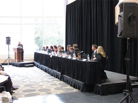 Skirted head-table platform set up for a panel or presentation