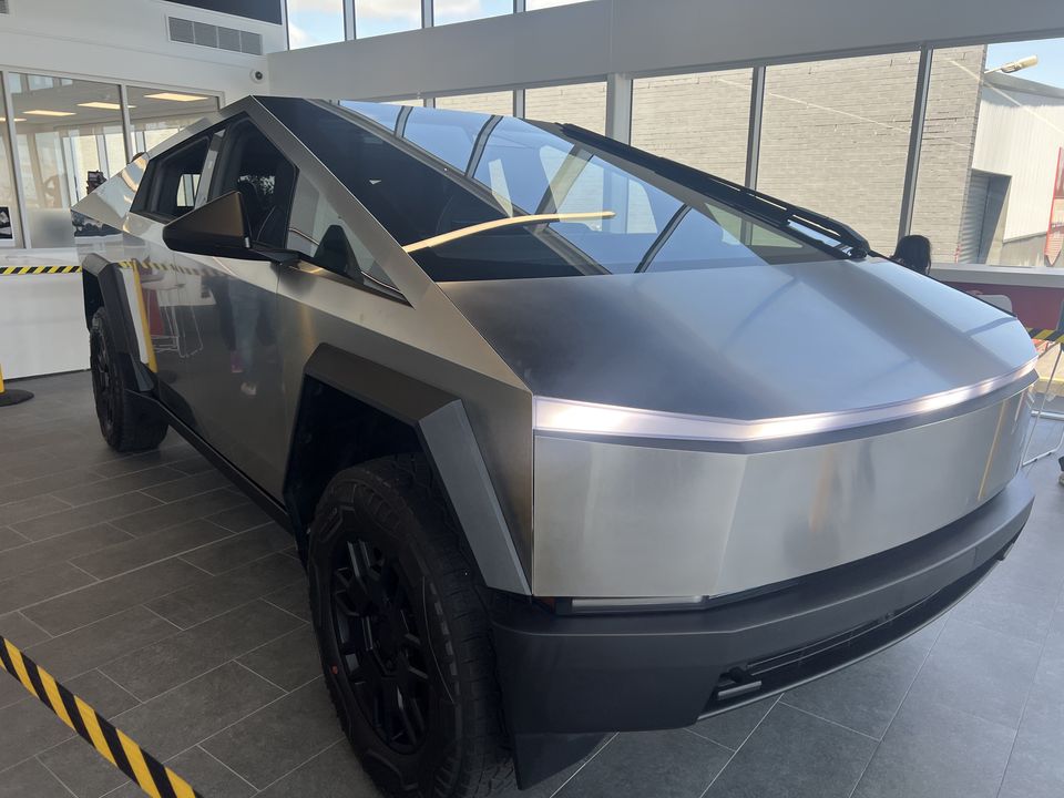 Stainless steel electric pickup on display indoors