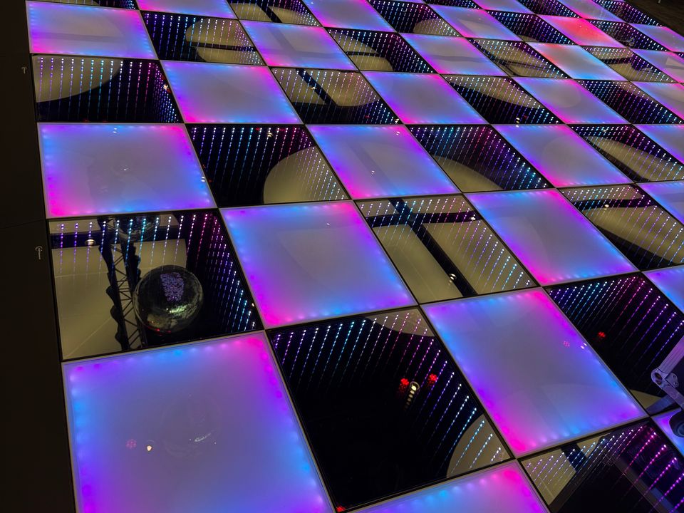Frosted and Infinity combined LED dance floor lit pink and purple